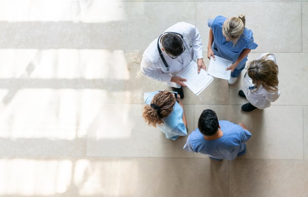 Care professionals viewed from above